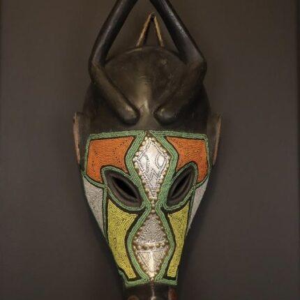 Handcrafted African Mask Long Striking Face