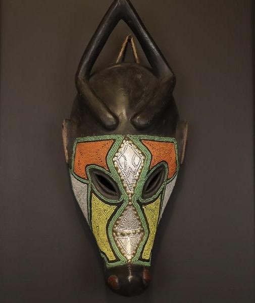 Handcrafted African Mask Long Striking Face