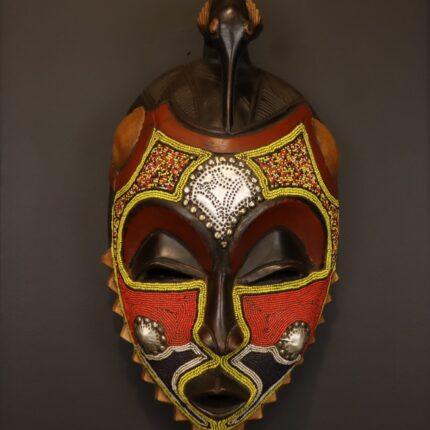 Crimson Bird Guardian Mask – African Beaded Wall Décor