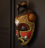 Crimson Bird Guardian Mask – African Beaded Wall Décor